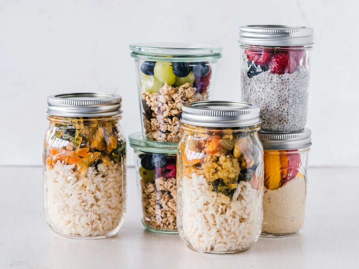 Clear glass storage jars filled with dry goods